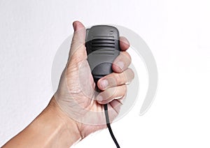 Hand holding speaker microphone