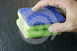 Hand holding a sponge