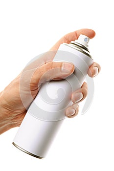 Hand holding a spray