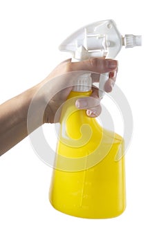 Hand holding spray cleaner plastic bottle