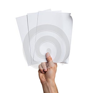 Hand holding a stack of blank white paper sheets isolated on white background