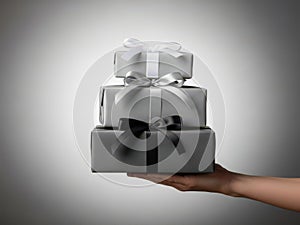 Stack of gift boxes with elegant ribbons