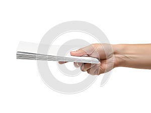 Hand holding a stack of white paper sheets