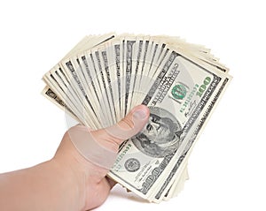 Hand holding stacks of 100 USD paper currency with clipping path