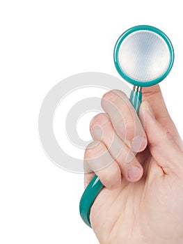 Hand holding a stethoscope isolated on white