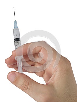 Hand holding syringe