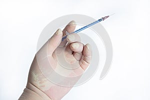 The hand holding the syringe.Isolated on a white background