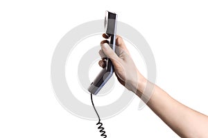 Hand holding telephone receiver