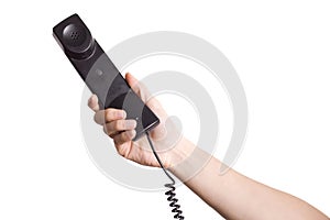 Hand holding telephone receiver