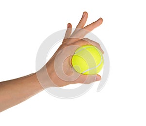 Hand holding tennis ball isolated on white clipping path