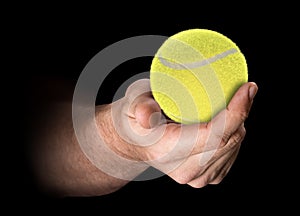 Hand Holding Tennis Ball