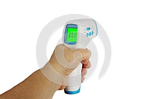 Hand holding Thermometer Gun Side View Medical Digital Non-Contact Infrared Sight Handheld Forehead Readings. Temperature