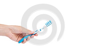 Hand holding tooth brush isolated on white background. copy space, template