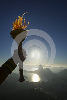 Hand Holding Torch Rio de Janeiro Brazil photo