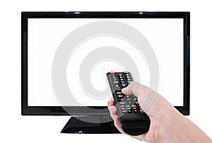 Hand holding TV remote with LED TV and blank screen isolated on