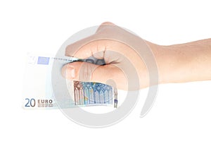 Hand holding twenty euro note isolated
