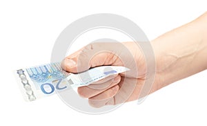 Hand holding twenty euro note isolated