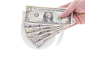 Hand Holding US Dollar Bills in Various Denomination photo