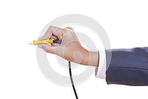 hand holding USB cable.