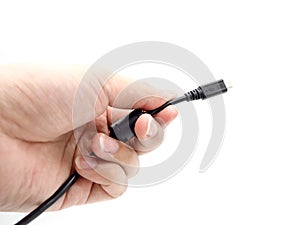 Hand holding USB cable isolated on a white background