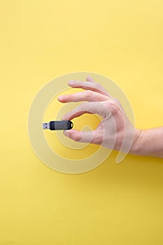 Usb memory flash drive on yellow background