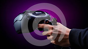 hand holding video controller, close-up of hand holding gamepad, gamer playing game with gamepad