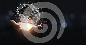 Hand holding virtual world with copy space and blue bokeh background for technology information and transformation concept