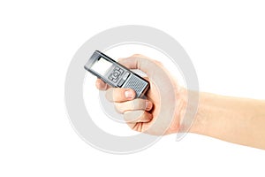 Hand holding a voice recorder. Close up. Isolated on white background