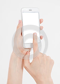 Hand holding white cellphone isolated on white clipping path inside. Online shopping. Top view. Mock up. Copy space. Template.Blan