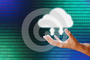 Hand holding white cloud storage computing icon on blue and green binary code background. Communication of business and financial