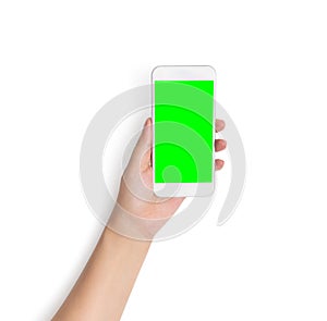 Hand holding white mobile smart phone with blank green screen isolated on white background with clipping path on green screen