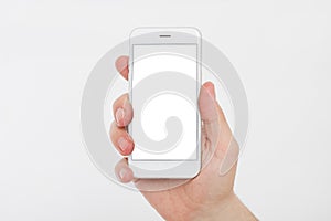 Hand holding white phone isolated on white clipping path inside. Top view.Mock up.Copy space.Template.Blank.
