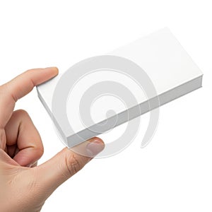 Hand holding a white rectangle