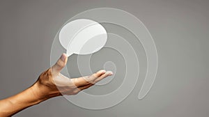 The hand holding speech balloon.AI generated image