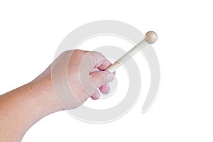 Hand holding a Woodenstick ,drumstick on background