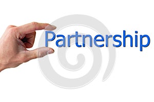 Hand holding the word partnership