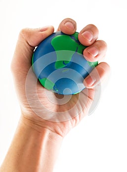 Hand holding world globe