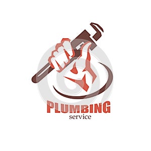 Hand holding a wrench, plumbing service