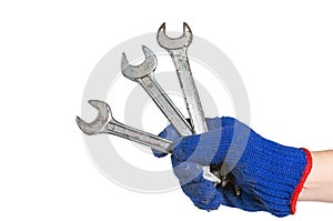 hand holding the wrench on white background. industrial equipment