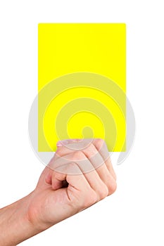 Hand Holding Yellow Card