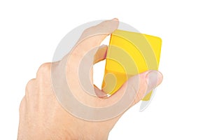 Hand holding a yellow cube, man gripping, reaching and grabbing a floating part, node, catching a hovering cube gesture isolated