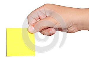 Hand holding a yellow sticker post-it note