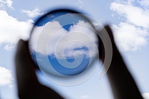 Hand holds a circular polarizer filter Accessory for the photographer