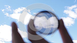 Hand holds a circular polarizer filter Accessory for the photographer