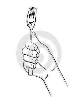 Hand holds fork. Kitchen accessory. Cutlery fork for cooking and eating second courses, salads, meat, side dishes