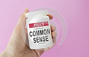 of pills, the inscription: COMMON SENSE photo