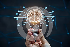 Hand holds light bulb with brain inside, surrounded by blue connections meant to symbolize innovation
