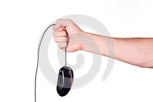 Hand holds mouse over wire on white background