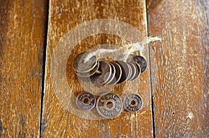 Hand holds Old Thai Satang Coin