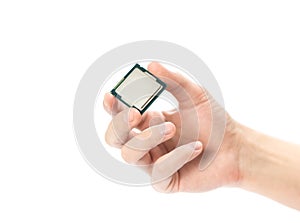 The hand holds a powerful desktop processor. Close up. Isolated on a white background